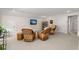 Versatile bonus room with a flat screen TV, seating, and carpet floors for relaxation and entertainment at 125 Leeward Landing, Summerville, SC 29486