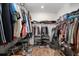 Spacious walk-in closet with ample shelving and hanging space for organized storage of clothes and shoes at 125 Leeward Landing, Summerville, SC 29486