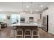 Bright kitchen features a large island, stainless steel appliances, and modern finishes at 125 Leeward Landing, Summerville, SC 29486