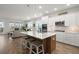 Modern, open kitchen featuring a spacious island, stainless steel appliances, and hardwood floors at 125 Leeward Landing, Summerville, SC 29486