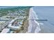 Aerial view of the condo community, pier and beach and the complex swimming pool at 1300 Ocean Blvd # 232, Isle of Palms, SC 29451