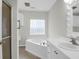 Bathroom boasts vanity, and large soaking tub, perfect for relaxation and spa like retreat at 1310 Pilsdon Crest, Mount Pleasant, SC 29464