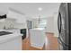 Modern kitchen with stainless appliances, ample counter space and room for dining at 1310 Pilsdon Crest, Mount Pleasant, SC 29464