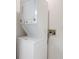 Efficient laundry area features a stacked washer and dryer unit for space-saving convenience at 1310 Pilsdon Crest, Mount Pleasant, SC 29464