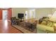 Inviting living room features cozy furniture, soft lighting and flows to other parts of the home at 1310 Pilsdon Crest, Mount Pleasant, SC 29464