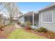 Charming home featuring a well-manicured lawn, a walkway, and beautiful landscaping at 1310 Pilsdon Crest, Mount Pleasant, SC 29464