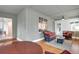 Open sunroom with seating, sliding glass doors and abundant natural light at 1310 Pilsdon Crest, Mount Pleasant, SC 29464