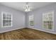 Bright bedroom with lots of natural light and beautiful wood floors at 1365 Whippoorwill Farm Rd, Johns Island, SC 29455