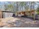 Outbuilding with shelving, perfect for storage or a workshop, adding practical space at 1365 Whippoorwill Farm Rd, Johns Island, SC 29455