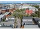 Aerial view showcases the city skyline and surrounding neighborhood at 15 Menotti St, Charleston, SC 29401