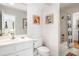 All white bathroom with shower and tub combination at 15 Menotti St, Charleston, SC 29401