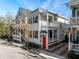 Charming two-story home with a red door at 15 Menotti St, Charleston, SC 29401