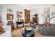 Inviting living room featuring stylish decor, hardwood floors, and ample natural light at 15 Menotti St, Charleston, SC 29401