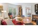 Cozy living area with hardwood floors, French doors, and an inviting atmosphere at 15 Menotti St, Charleston, SC 29401