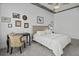 Spacious bedroom featuring a ceiling fan, neutral walls, and a comfortable bed at 150 Bee St # 312, Charleston, SC 29401
