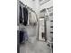 Walk-in closet with mirror and ample storage space for clothes and shoes at 150 Bee St # 312, Charleston, SC 29401
