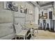 Cozy dining area featuring a rustic wooden table, comfortable seating, and exposed concrete walls at 150 Bee St # 312, Charleston, SC 29401