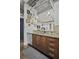 Stylish kitchen features granite counters, stainless steel appliances, and sleek wood cabinetry at 150 Bee St # 312, Charleston, SC 29401