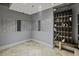 Well-lit mail room with individual mailboxes and package storage, providing secure and organized mail delivery at 150 Bee St # 312, Charleston, SC 29401