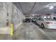 Secured parking garage with marked parking spaces, offering convenient and safe parking for residents at 150 Bee St # 312, Charleston, SC 29401