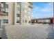 Expansive outdoor patio area with patterned paving and seating, perfect for relaxation and entertaining at 150 Bee St # 312, Charleston, SC 29401