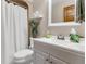 Bright bathroom features a shower, white vanity, and modern decor at 1715 Greystone Blvd Blvd # 25, Mount Pleasant, SC 29464