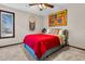 Cozy bedroom with carpet, ceiling fan, and vibrant artwork at 1715 Greystone Blvd Blvd # 25, Mount Pleasant, SC 29464