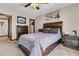 This well-lit bedroom features a comfortable queen bed and access to the en-suite bathroom at 1715 Greystone Blvd Blvd # 25, Mount Pleasant, SC 29464