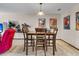 Dining area with wooden table and seating for four at 1715 Greystone Blvd Blvd # 25, Mount Pleasant, SC 29464