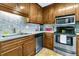 Updated kitchen with stainless steel appliances and modern backsplash at 1715 Greystone Blvd Blvd # 25, Mount Pleasant, SC 29464