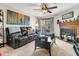 Inviting living room features a ceiling fan and fireplace at 1715 Greystone Blvd Blvd # 25, Mount Pleasant, SC 29464