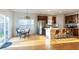 Bright eat-in kitchen with a large island, stainless steel appliances, and a modern lighting fixture at 1749 Towne St, Johns Island, SC 29455