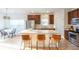 Bright kitchen with an island, stainless steel appliances, and a cozy breakfast nook at 1749 Towne St, Johns Island, SC 29455