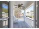 Cozy porch featuring a rocking chair and ceiling fan, perfect for relaxing outdoors at 1749 Towne St, Johns Island, SC 29455