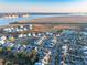 Scenic aerial view of a quaint neighborhood near the coast, showcasing its harmonious layout at 1962 Bellona St, Charleston, SC 29492