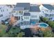 A backyard paradise with a pool, deck, and manicured lawn perfect for entertaining and relaxation at 1962 Bellona St, Charleston, SC 29492