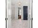 Bright bathroom with shiplap walls, spacious shower, and navy storage cabinet at 1962 Bellona St, Charleston, SC 29492