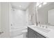 Stylish bathroom with tub and shower combination, white vanity, and sleek fixtures at 1962 Bellona St, Charleston, SC 29492