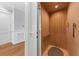 Residential elevator featuring wood-paneled walls and modern operating panel at 1962 Bellona St, Charleston, SC 29492