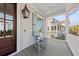 Cozy front porch with rocking chair providing an inviting space to relax and enjoy the outdoors at 1962 Bellona St, Charleston, SC 29492