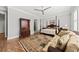 Spacious main bedroom with a large wardrobe and traditional four-poster bed at 1962 Bellona St, Charleston, SC 29492