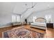 Large main bedroom suite with vaulted ceilings, ceiling fan, hardwood floors, and lots of light at 1962 Bellona St, Charleston, SC 29492