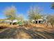 Well-maintained playground area features a jungle gym and swings surrounded by mature trees at 1962 Bellona St, Charleston, SC 29492