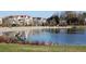 Scenic view of a pond, with homes in the background, and a statue in the foreground at 1962 Bellona St, Charleston, SC 29492