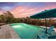 A serene pool area with comfortable seating, ideal for enjoying sunny days and relaxation at 1962 Bellona St, Charleston, SC 29492