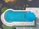 Aerial view of backyard pool and travertine tile pool surround at 1962 Bellona St, Charleston, SC 29492