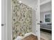 Shower featuring a marine-themed curtain, with a view into the bedroom showcasing a bed at 205 Cozy Brook Ct, Summerville, SC 29486