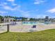 Resort-style pool with plenty of lounge chairs, sun umbrellas and water slide at 205 Cozy Brook Ct, Summerville, SC 29486