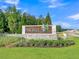 Welcome to Pine Hills: a beautifully landscaped entrance to a wonderful community at 205 Cozy Brook Ct, Summerville, SC 29486