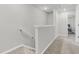 Well-lit hallway leading to a bedroom with neutral carpet and paint at 205 Cozy Brook Ct, Summerville, SC 29486